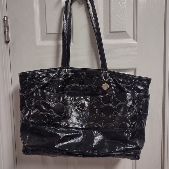Black leather coach diaper bag clearance